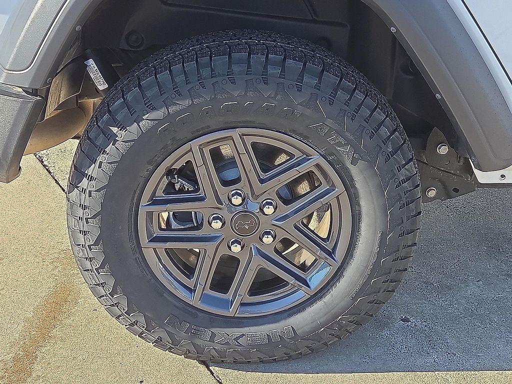 used 2024 Jeep Wrangler car, priced at $30,306