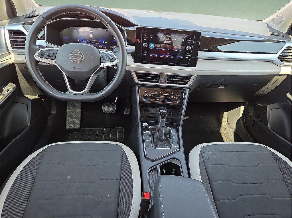 used 2025 Volkswagen Taos car, priced at $22,995
