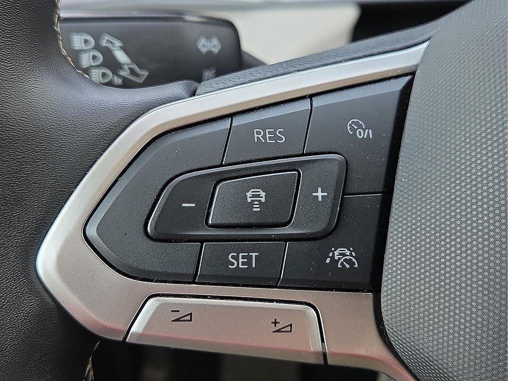 used 2025 Volkswagen Taos car, priced at $22,995
