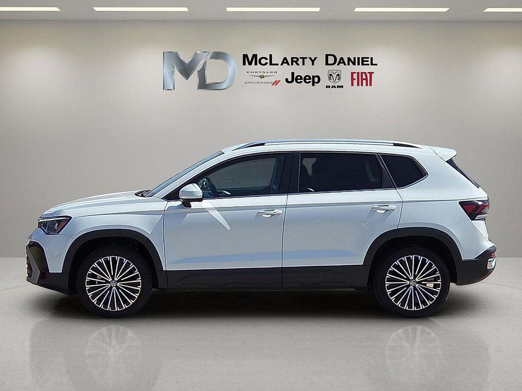 used 2025 Volkswagen Taos car, priced at $22,995