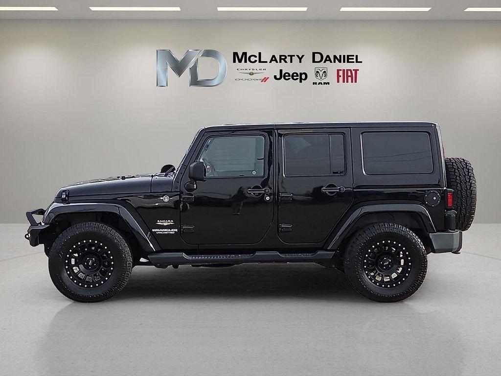 used 2013 Jeep Wrangler Unlimited car, priced at $12,339
