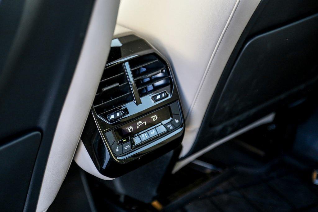 used 2025 BMW iX car, priced at $101,320