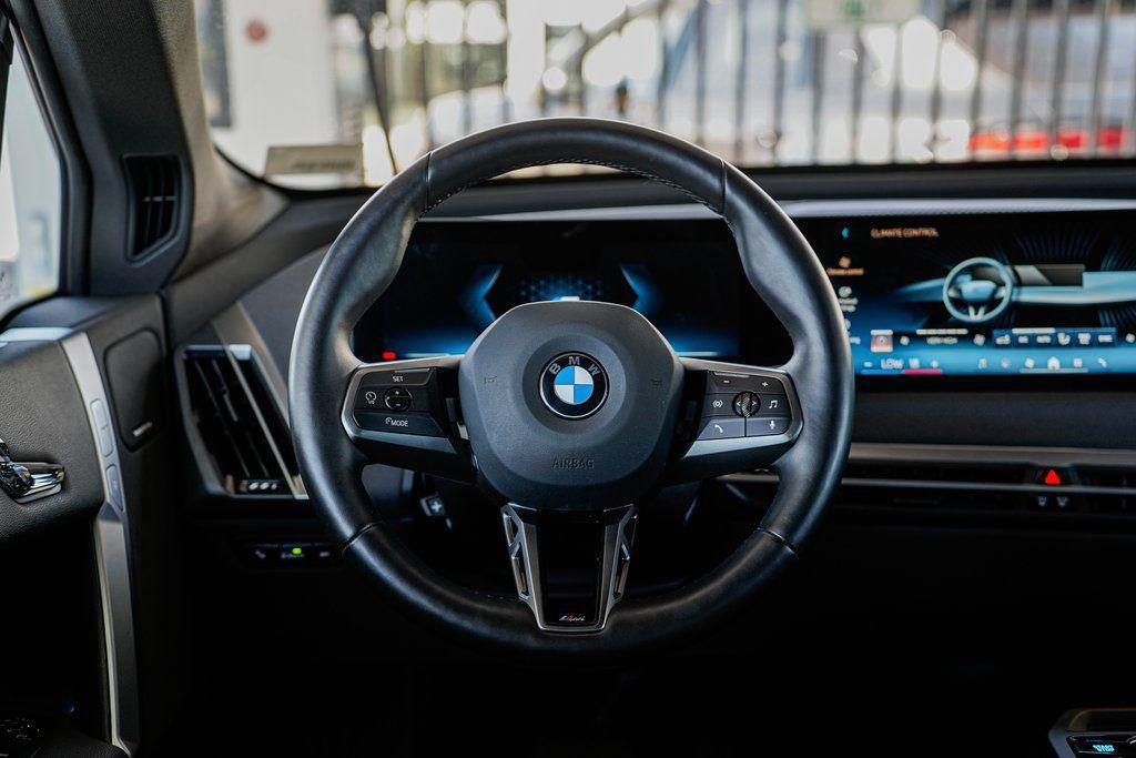 used 2025 BMW iX car, priced at $93,080