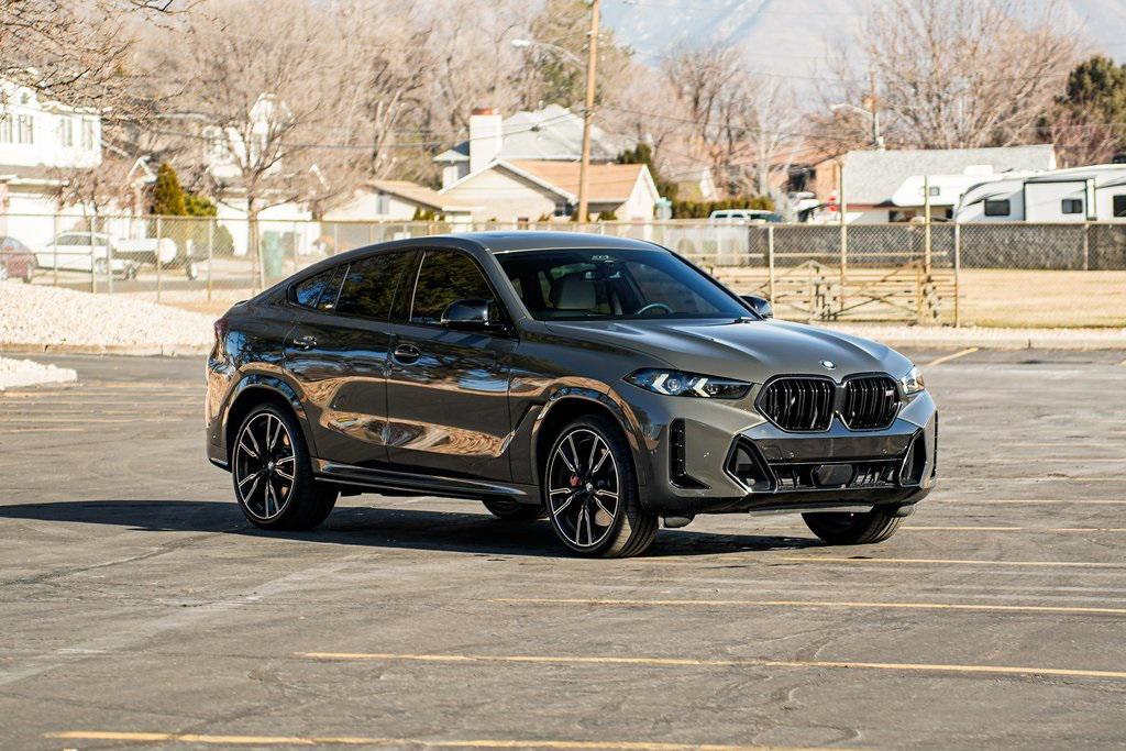 used 2025 BMW X6 car, priced at $82,995