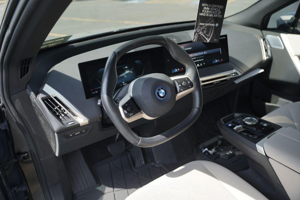 used 2024 BMW iX car, priced at $48,995