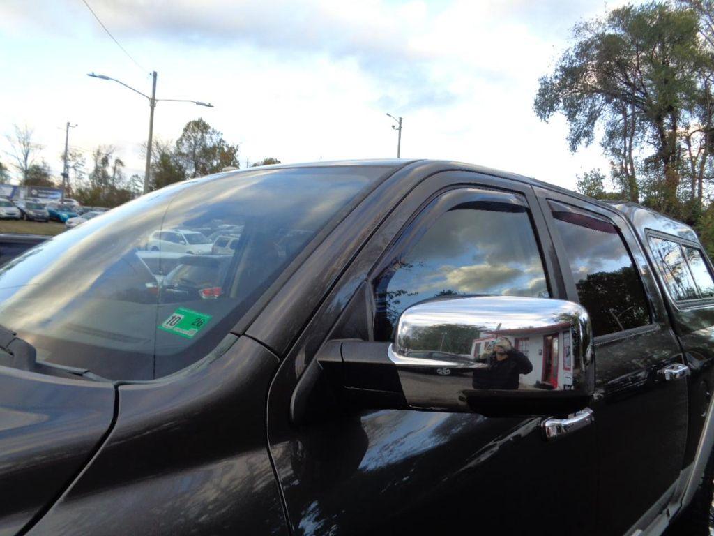 used 2014 Ram 1500 car, priced at $15,600