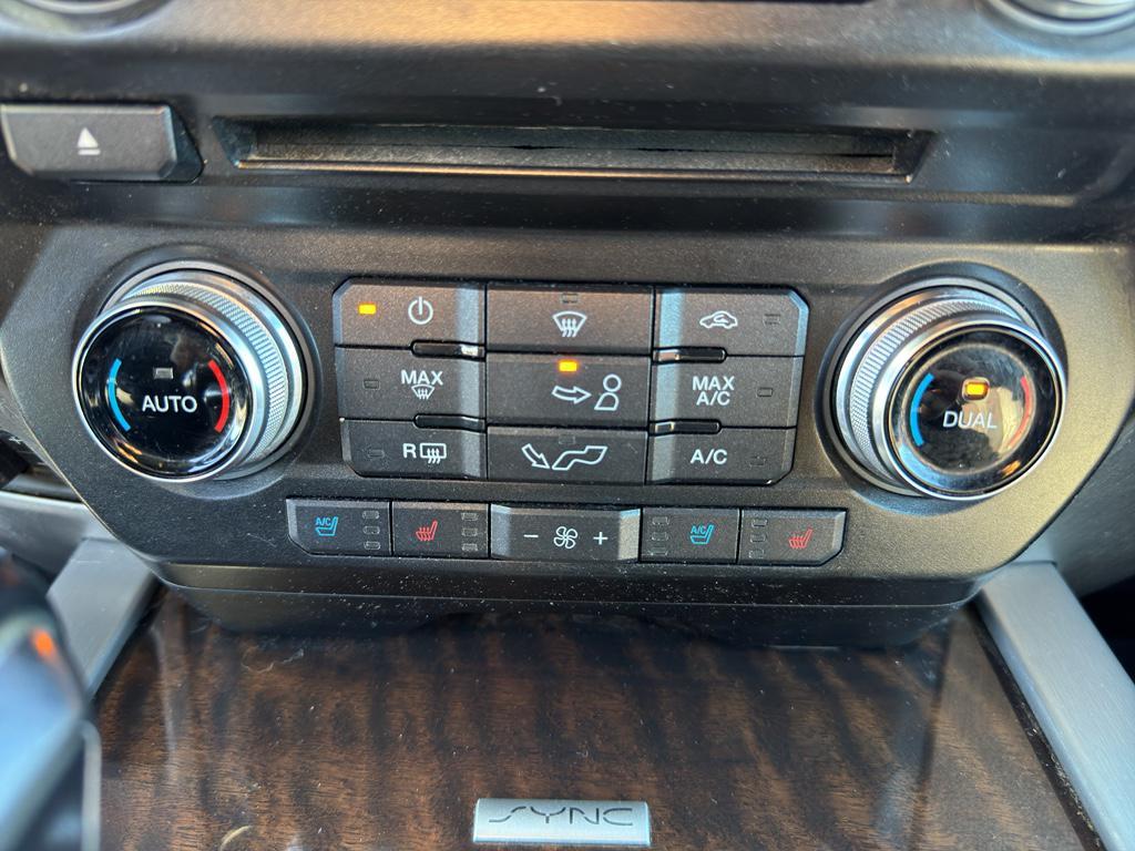 used 2015 Ford F-150 car, priced at $23,477