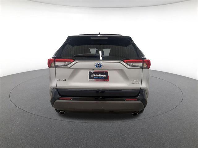 used 2021 Toyota RAV4 Hybrid car, priced at $28,000