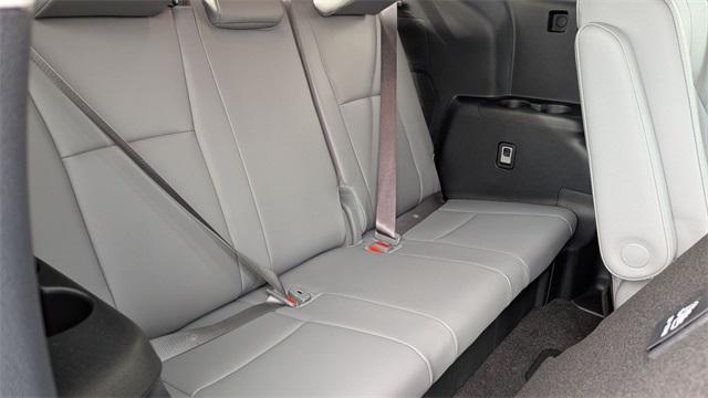 used 2025 Toyota Highlander Hybrid car, priced at $54,500