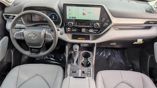 used 2025 Toyota Highlander Hybrid car, priced at $54,500