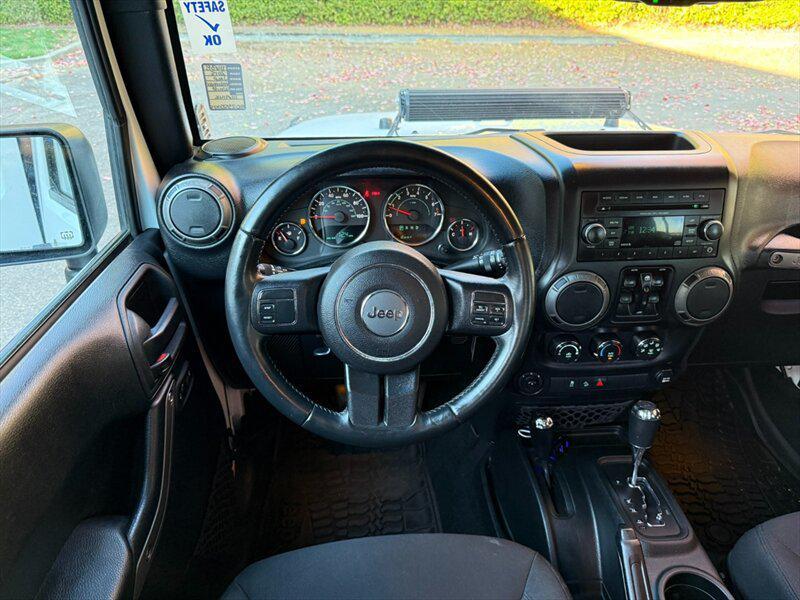 used 2015 Jeep Wrangler Unlimited car, priced at $20,988