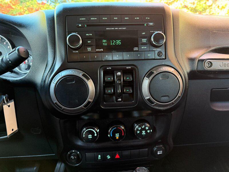 used 2015 Jeep Wrangler Unlimited car, priced at $20,988