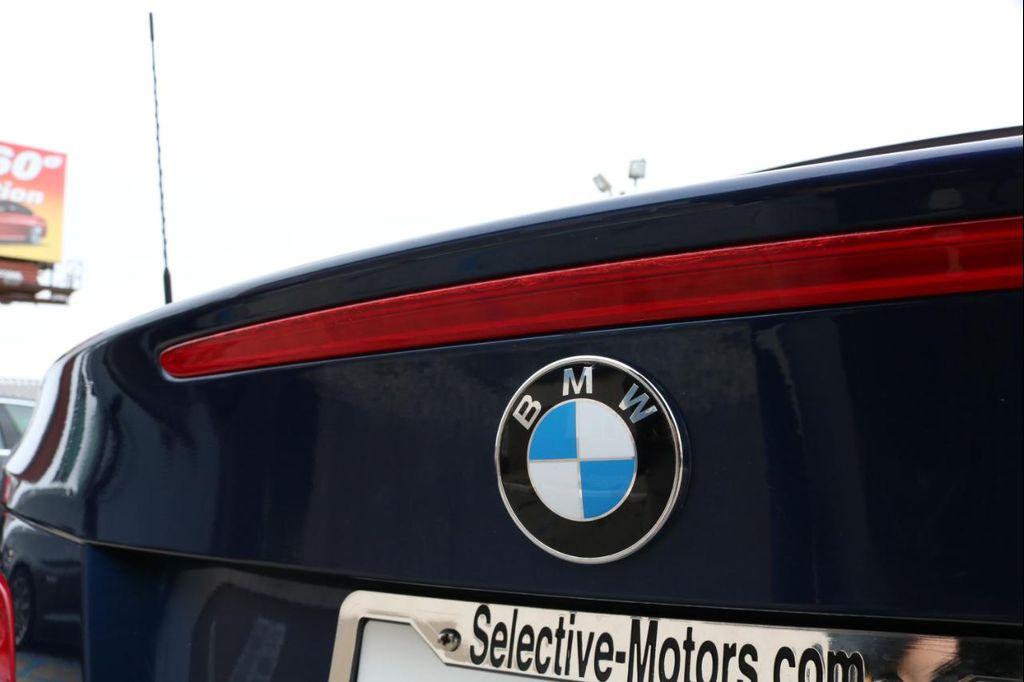 used 2011 BMW 128 car, priced at $10,888