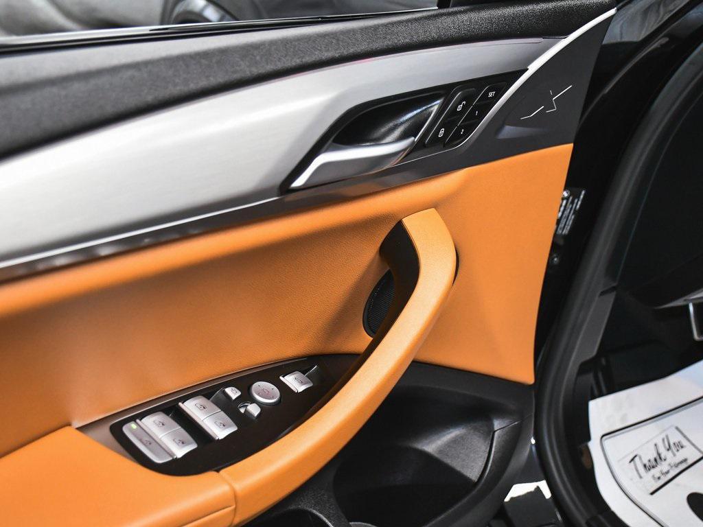 used 2025 BMW X4 car, priced at $48,990