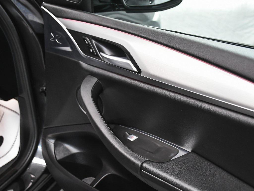 used 2025 BMW X4 car, priced at $47,490