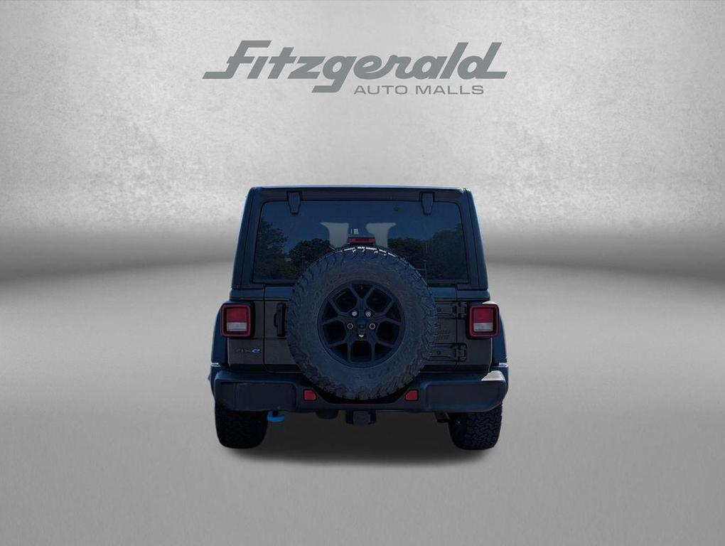 used 2024 Jeep Wrangler 4xe car, priced at $30,294