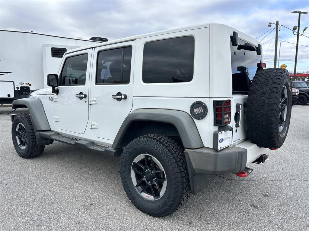 used 2014 Jeep Wrangler Unlimited car, priced at $16,990