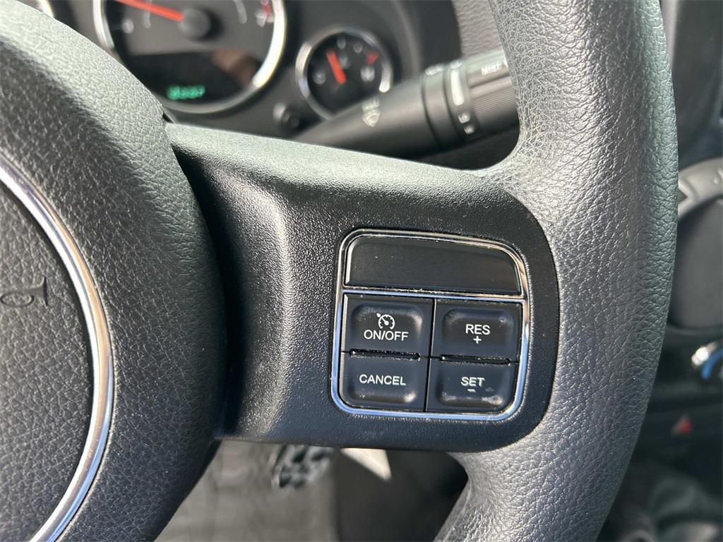 used 2014 Jeep Wrangler Unlimited car, priced at $16,990