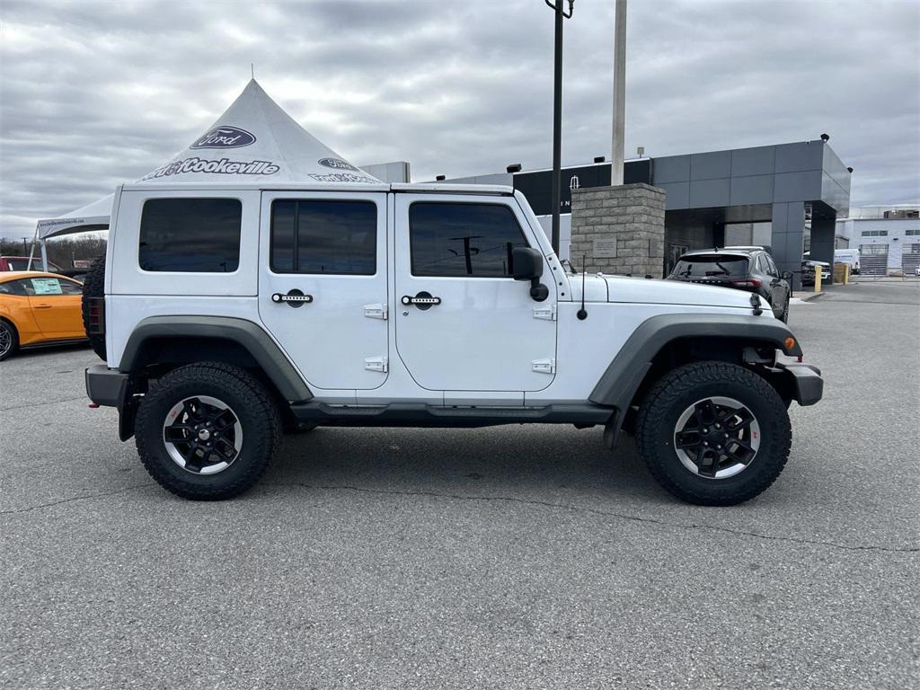 used 2014 Jeep Wrangler Unlimited car, priced at $16,990