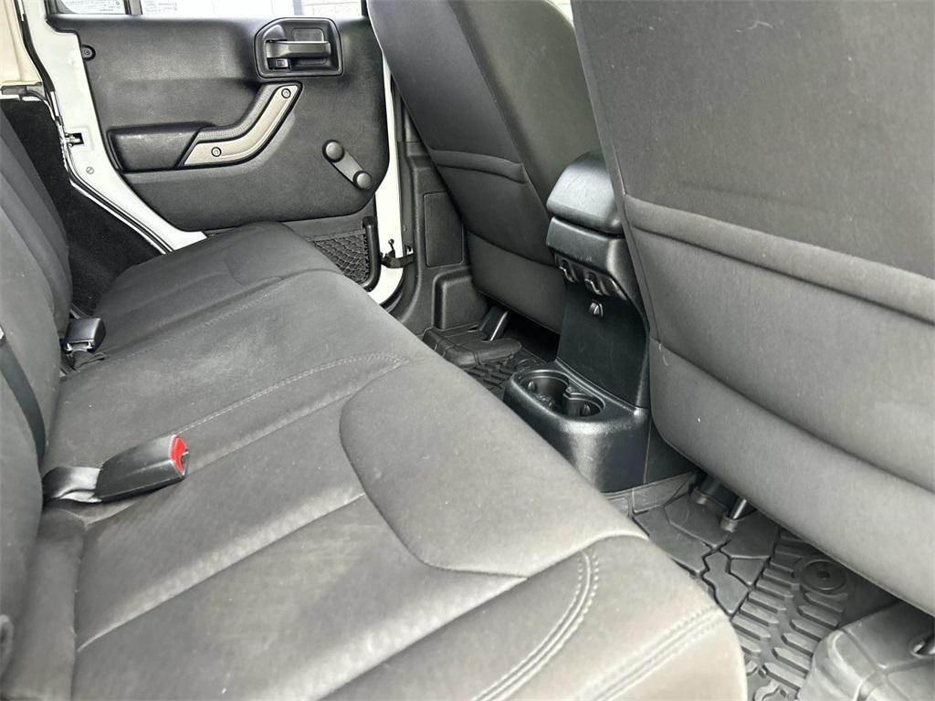 used 2014 Jeep Wrangler Unlimited car, priced at $16,990