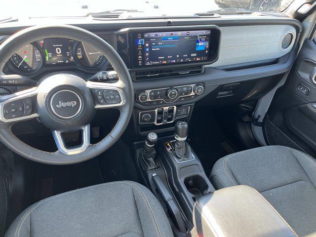 used 2024 Jeep Wrangler 4xe car, priced at $32,139