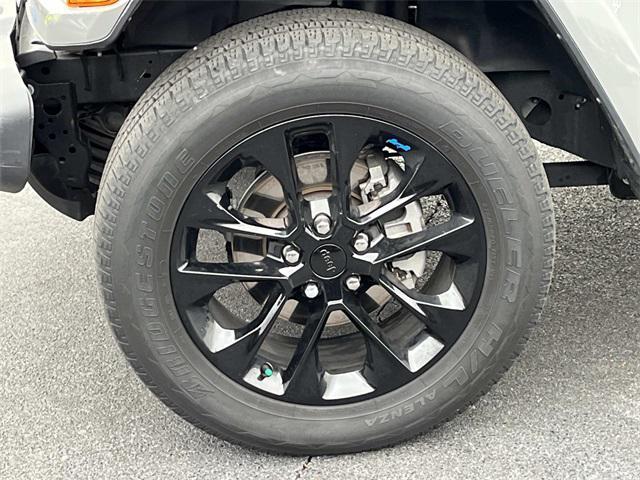 used 2023 Jeep Wrangler 4xe car, priced at $33,147