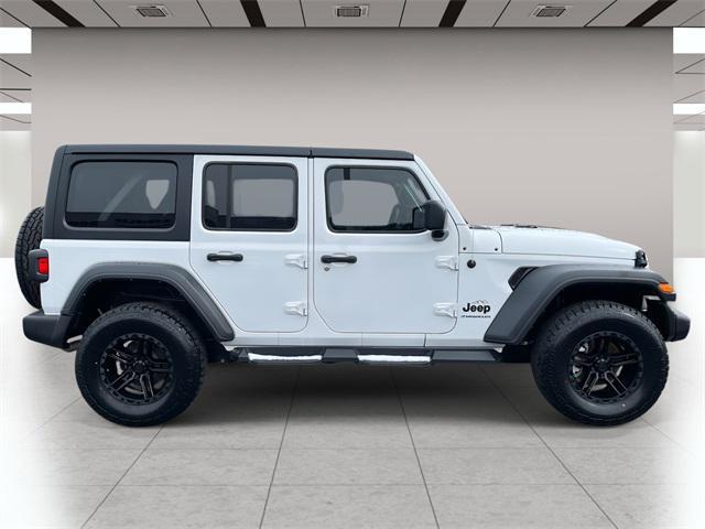 used 2023 Jeep Wrangler car, priced at $30,373