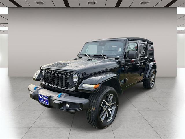 used 2024 Jeep Wrangler 4xe car, priced at $29,539