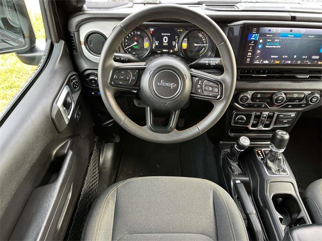 used 2024 Jeep Wrangler 4xe car, priced at $29,539