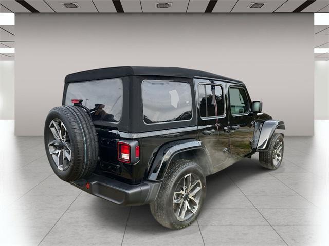 used 2024 Jeep Wrangler 4xe car, priced at $29,539