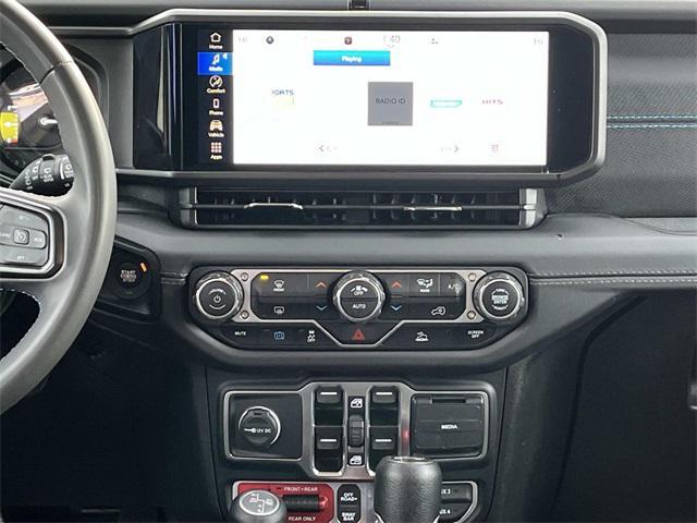 used 2024 Jeep Wrangler 4xe car, priced at $32,487