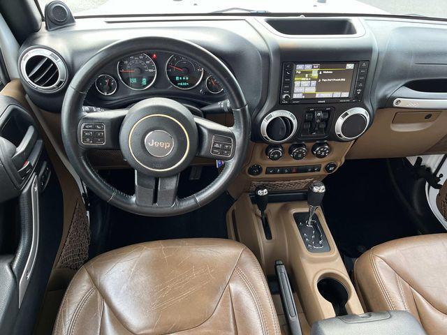 used 2014 Jeep Wrangler Unlimited car, priced at $15,879