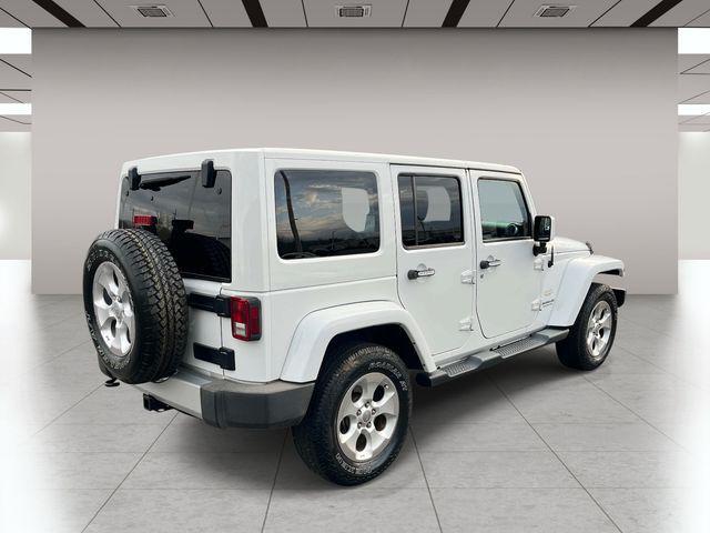 used 2014 Jeep Wrangler Unlimited car, priced at $15,879