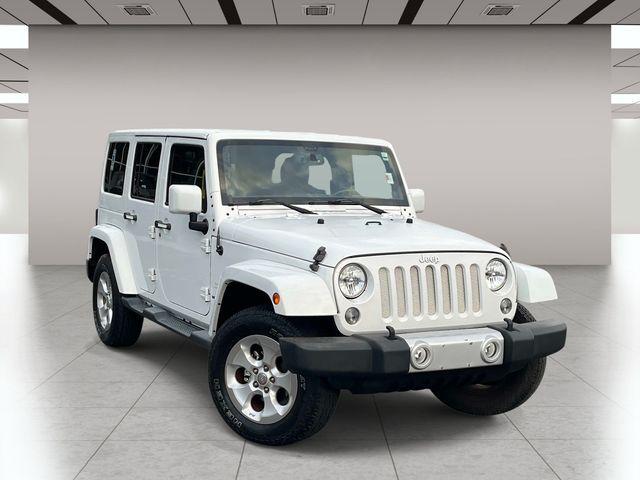 used 2014 Jeep Wrangler Unlimited car, priced at $15,879