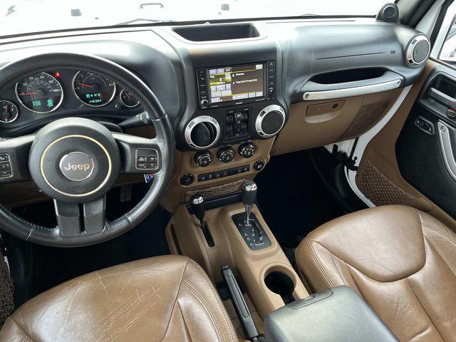 used 2014 Jeep Wrangler Unlimited car, priced at $15,879