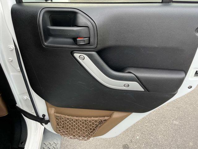 used 2014 Jeep Wrangler Unlimited car, priced at $15,879