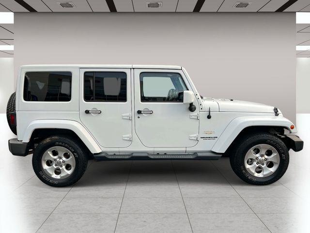 used 2014 Jeep Wrangler Unlimited car, priced at $15,879