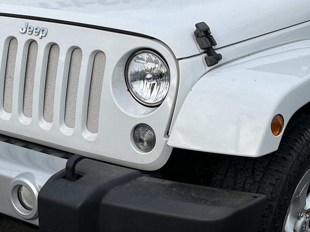 used 2014 Jeep Wrangler Unlimited car, priced at $15,879