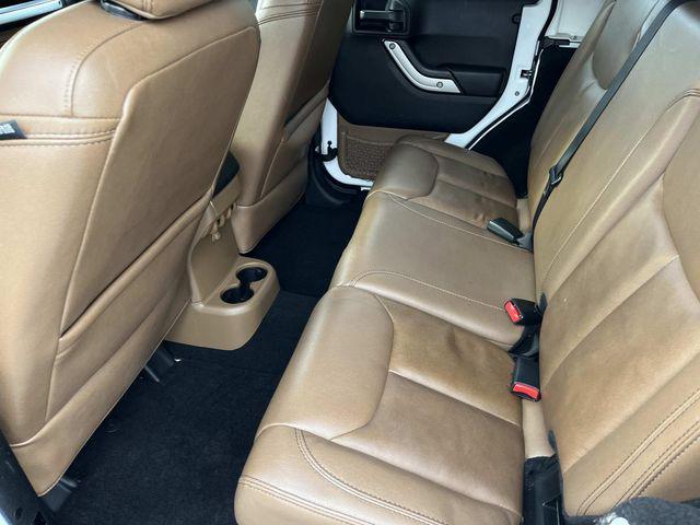 used 2014 Jeep Wrangler Unlimited car, priced at $15,879