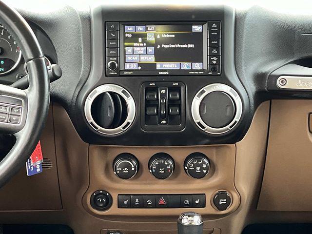 used 2014 Jeep Wrangler Unlimited car, priced at $15,879