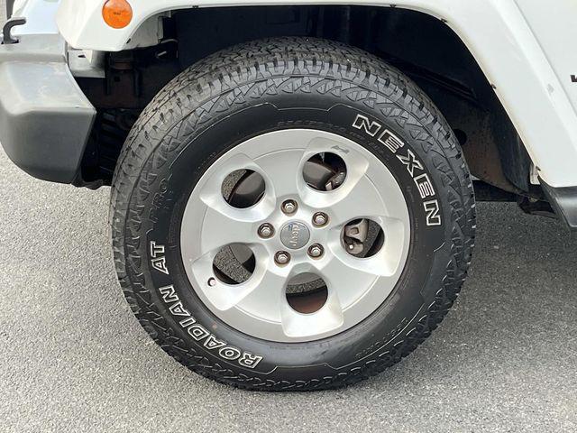 used 2014 Jeep Wrangler Unlimited car, priced at $15,879