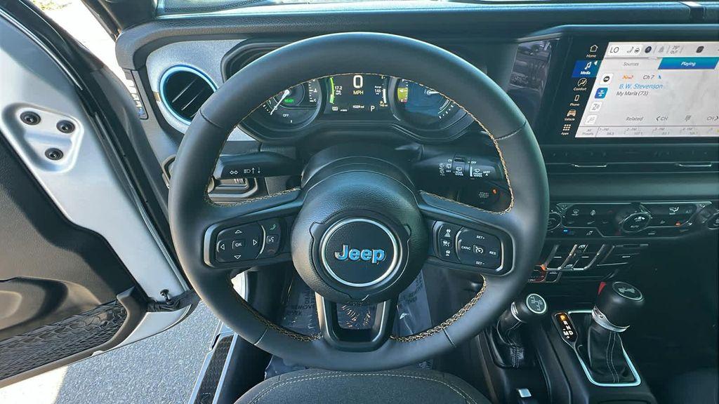 used 2024 Jeep Wrangler 4xe car, priced at $31,380