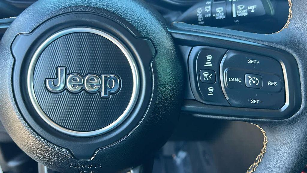used 2024 Jeep Wrangler 4xe car, priced at $31,380