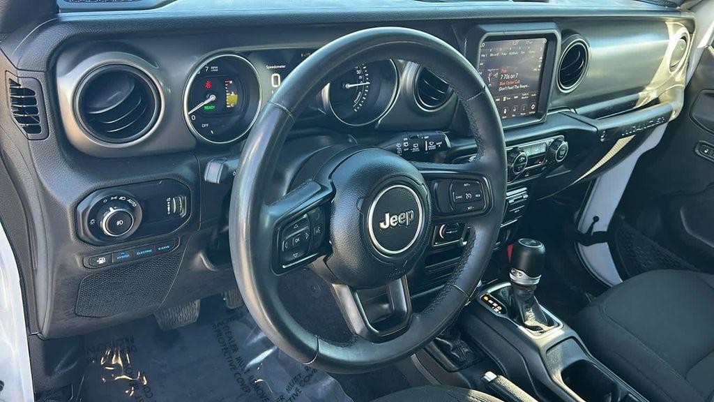 used 2023 Jeep Wrangler 4xe car, priced at $27,780