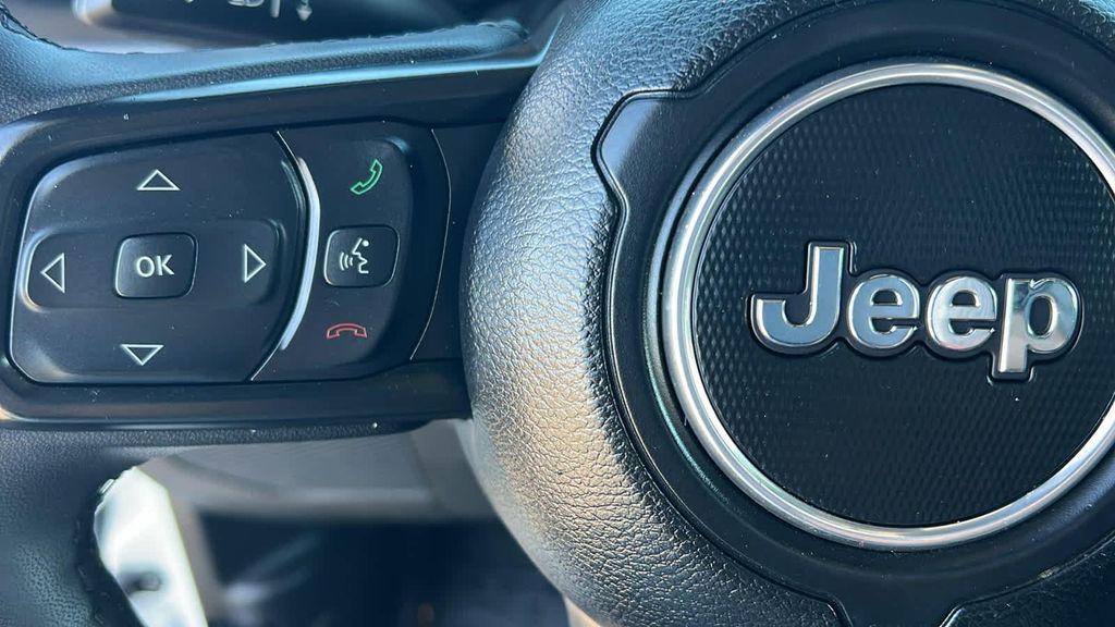 used 2023 Jeep Wrangler 4xe car, priced at $27,780