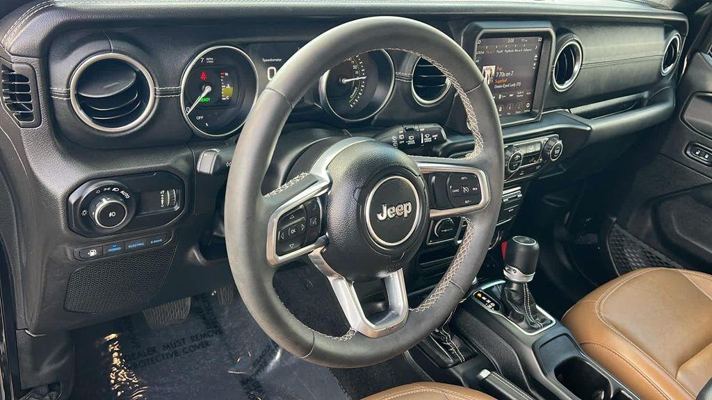 used 2023 Jeep Wrangler 4xe car, priced at $29,680