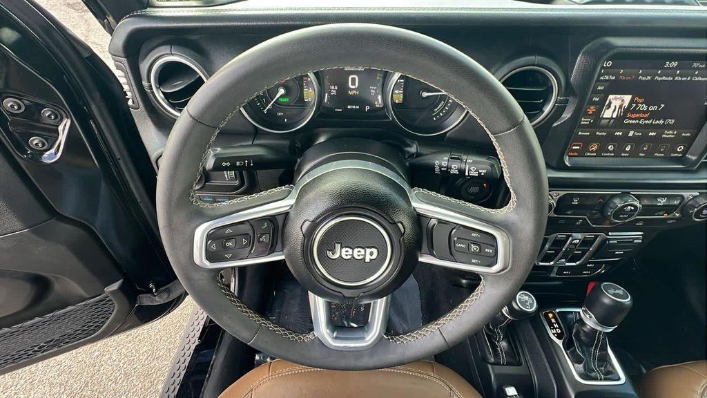 used 2023 Jeep Wrangler 4xe car, priced at $29,680