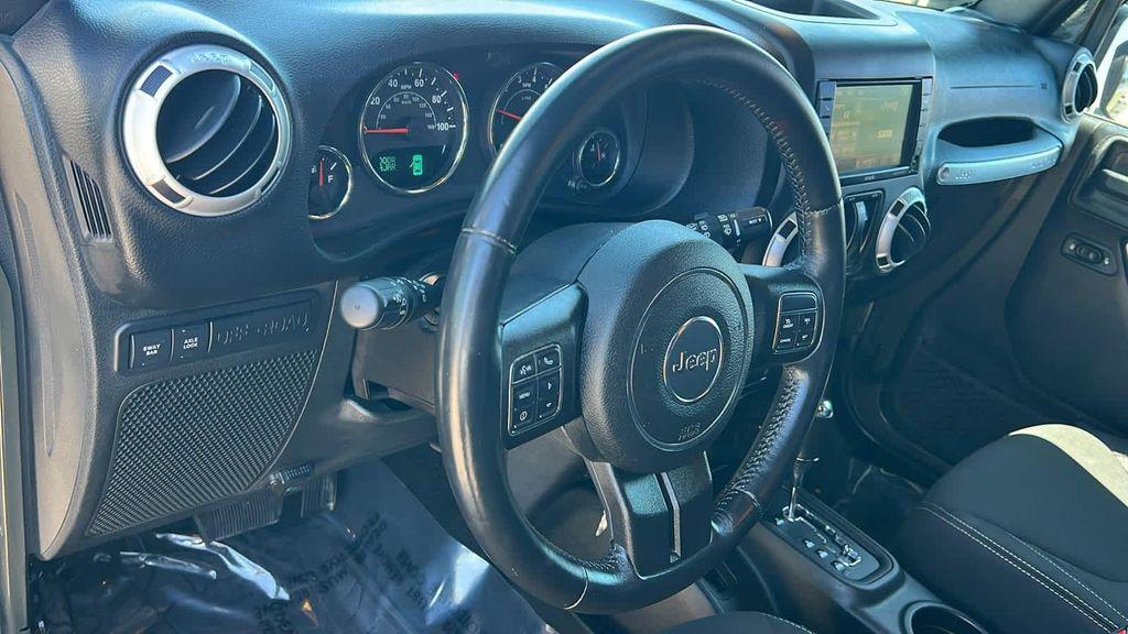 used 2016 Jeep Wrangler car, priced at $25,880