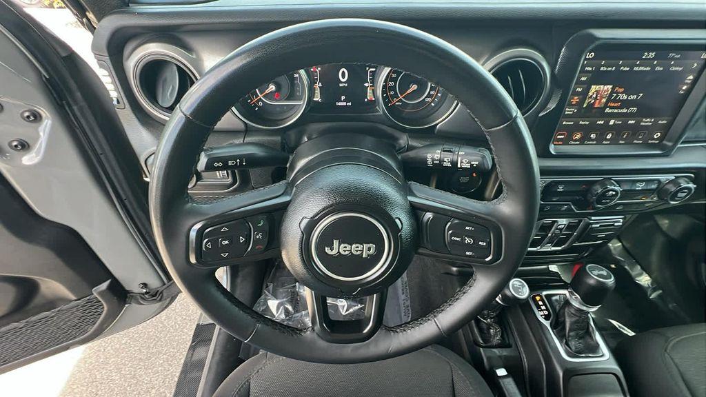 used 2023 Jeep Wrangler car, priced at $35,880