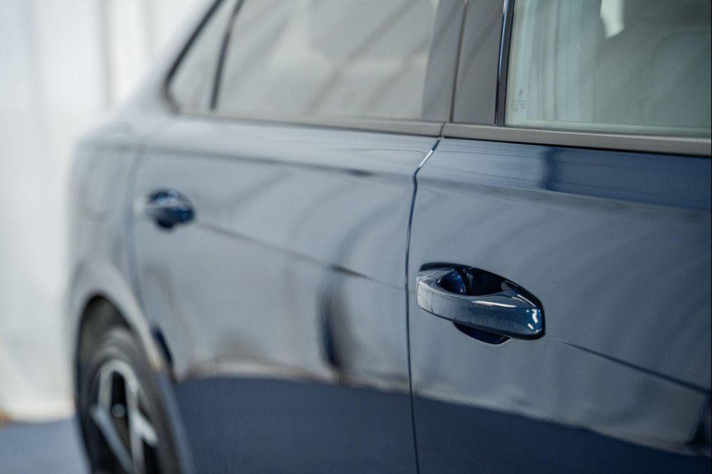 used 2021 Volkswagen Passat car, priced at $21,000